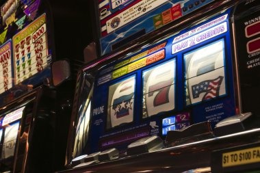 kombo99 Starburst game controls showing bet slider and spin button